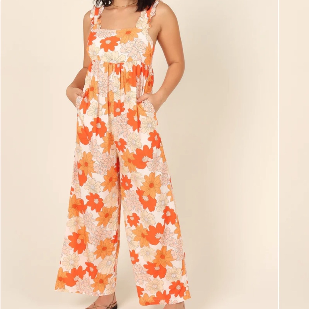 Beautiful, brand new, never worn, NWT floral jumpsuit!